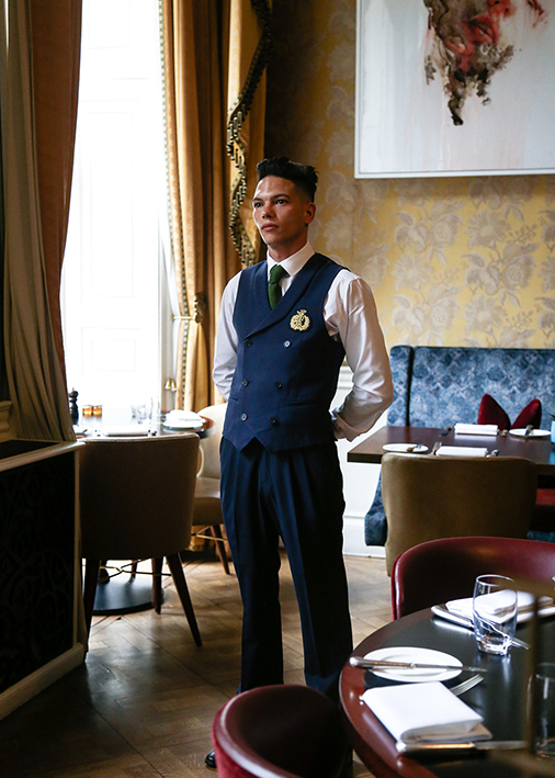 Home House uniforms designed by Field Grey, a bespoke uniform design agency in London, UK.