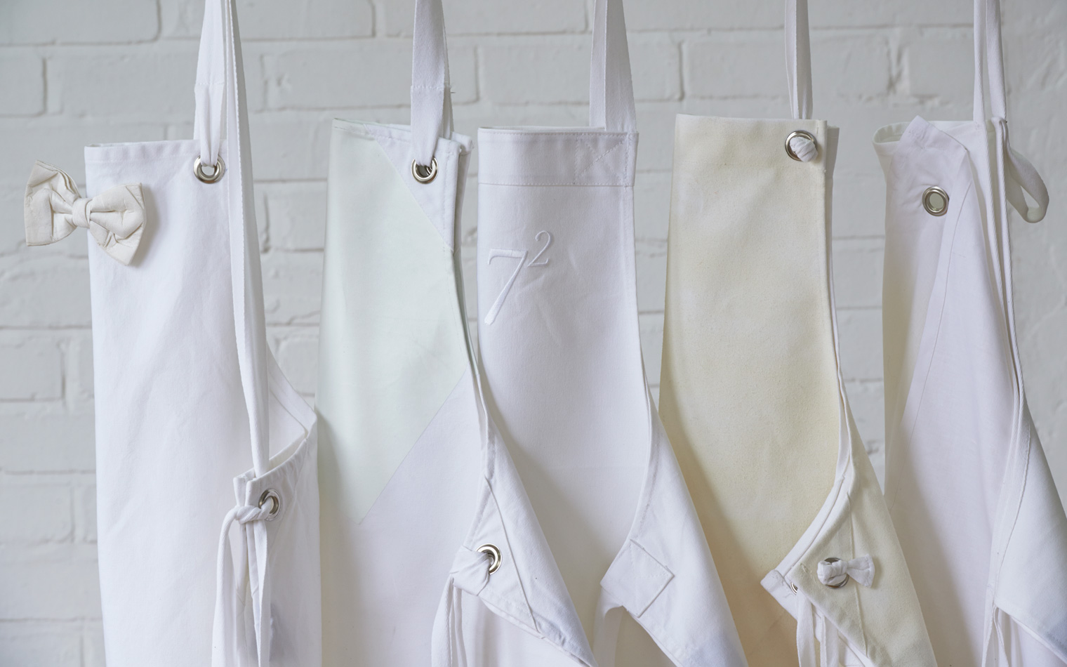 field-grey-bespoke-apron-embroidery-eyelet-restaurantandbardesignawards