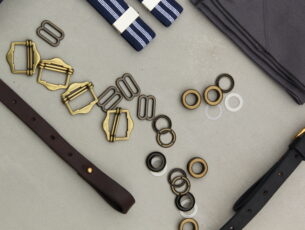 Close up of readywear materials, belts and metal accessories